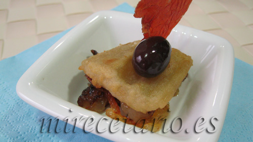 Cardo frito sobre cebolla caramelizada y jamón de Teruel con olivas negras del Bajo Aragón