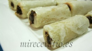 Huesos de Santo rellenos de crema de chocolate a la naranja.