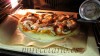 El horno a todo trapo y la pizza sobre la piedra.