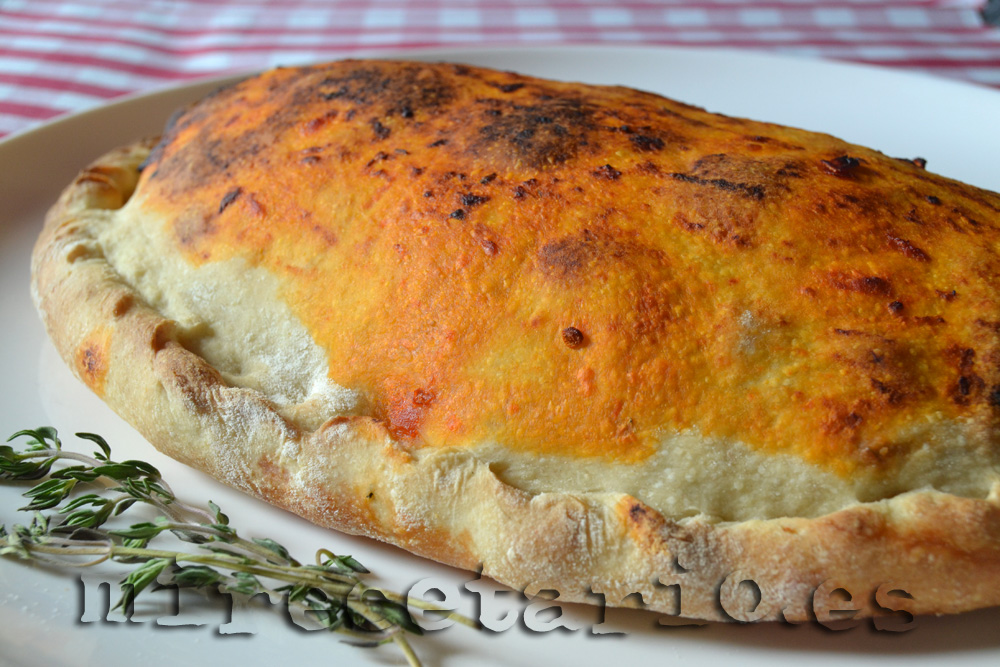 Calzone de trigueros y gambas