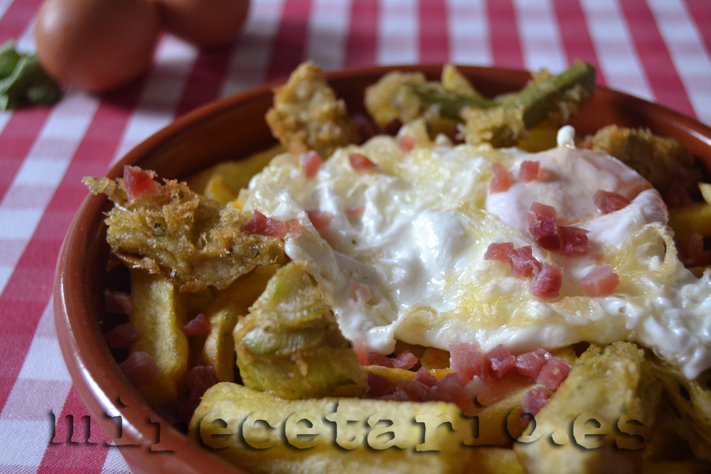 Huevos rotos con alcachofas en tempura de limón